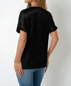 Rear view of a loose black satin T-shirt with silk-like texture and short sleeves