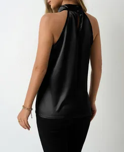 Detailed back view of a chic black satin halter neck sleeveless top with button closure