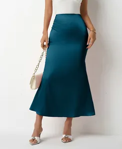 Elegant teal satin mermaid maxi skirt with a smooth glossy finish for summer