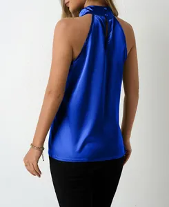 Back view of a royal blue satin halter tank top showing the buttoned neck closure detail