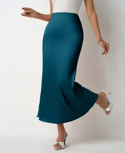 Detailed view of an elegant teal satin fishtail skirt with a smooth glossy finish
