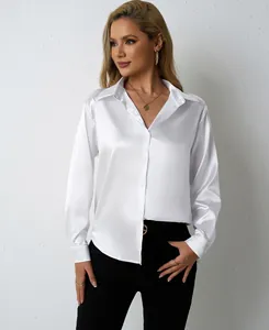 Detail of elegant white satin long-sleeved shirt with button-down V-neck design