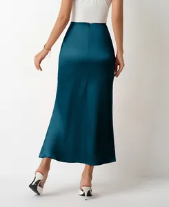Back view of a sleek teal satin midi skirt with elegant mermaid silhouette and glossy finish.