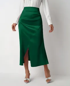 Elegant high-waisted dark green satin midi skirt with side pleats and front slit detail