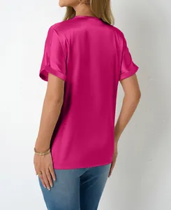 Detailed view showing back texture of a hot pink satin short sleeve V-neck top for women