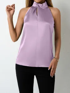 Lavender satin halter neck sleeveless top with V-neck detail shown on a model