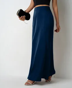 Elegant dark blue satin maxi skirt with a smooth finish and a high-waisted flowy drape