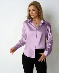Detailed view of women's purple satin shirt with elegant v-neck and long sleeves