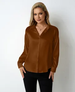 Detailed front view of women's elegant long sleeve brown satin shirt with V-neck and buttons