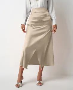 Elegant champagne high waist satin midi skirt with side slit and pleated detail