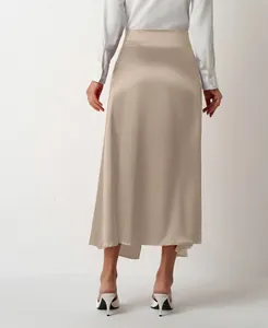 Detailed back view of an elegant high-waist champagne satin maxi skirt for women