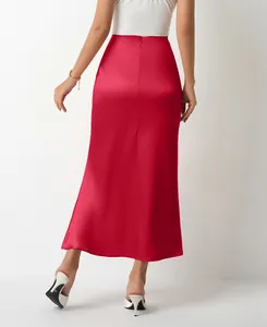 Back view detail of high-waisted red satin midi skirt with elegant fishtail hemline