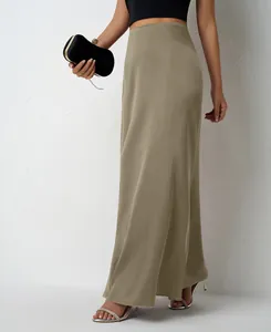 Elegant high-waisted khaki satin maxi skirt shown in a stylish full-length pose