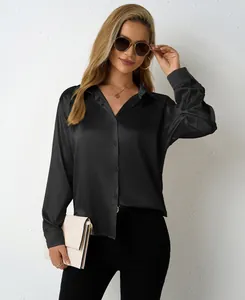 Detail view of an elegant black satin long-sleeved button-down shirt for women
