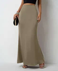 Close-up of olive green satin maxi skirt with smooth texture and elegant drape