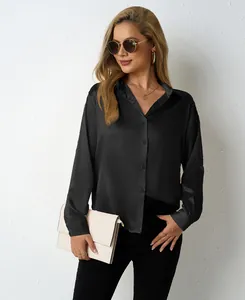 Model wearing a black satin long-sleeved shirt with elegant V-neckline for women