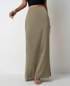 Detailed view of elegant khaki satin maxi skirt featuring smooth silky texture and shine