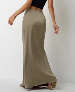 Rear view of a silky satin olive green maxi skirt for women in a minimalist style