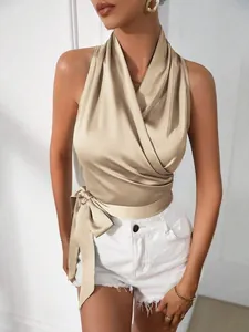 Elegante champagne satijnen dames haltertop met een grote strik aan de zijkant chic