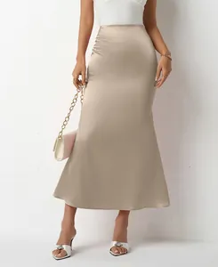 Champagne satin midi skirt features a slim fit design and elegant mermaid fishtail hem
