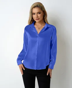Elegant royal blue satin long-sleeved shirt with V-neckline shown in detail view