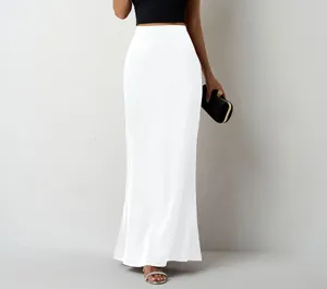 Full view of elegant white satin maxi skirt with high waist and flowing silhouette