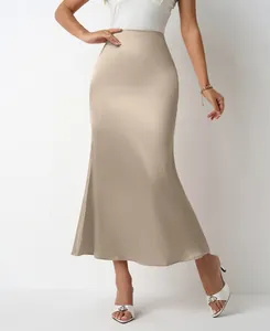 Detailed view of an elegant champagne satin midi mermaid skirt with a slim fit design