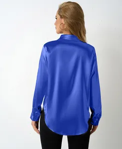 Detailed back view of a vibrant royal blue satin long-sleeved blouse with elegant curved hemline
