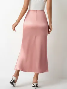 Elegant high waisted pink satin midi skirt featuring a slim fit mermaid hem silhouette
