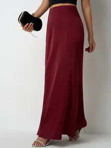 Elegant burgundy satin maxi skirt for women with a high waist and flowy silky finish