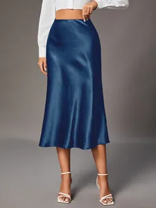 Elegant navy blue high-waist satin midi skirt featuring a smooth silk-like fabric finish