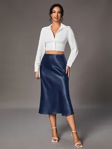 Navy blue satin midi skirt for women with elegant silk-like finish and high waist.