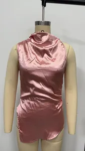 Detail view of pink sleeveless satin top with elegant draped collar design