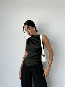 Detailed view of elegant black satin sleeveless top with silk-like finish