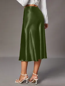Back view of elegant olive green satin midi skirt with luxurious silk-like texture