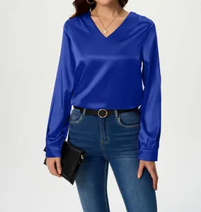 Elegant women's royal blue satin V-neck blouse with long sleeves and smooth texture.
