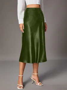 Elegant dark green satin midi skirt featuring a smooth silk-like texture and high waist fit