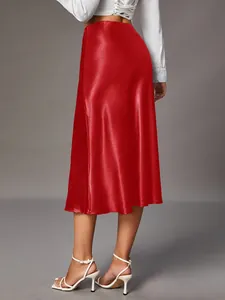 Elegant red satin midi skirt with a high-waisted fit and silky finish back view.