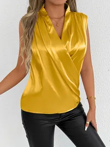 Elegant yellow satin sleeveless wrap blouse with sophisticated V-neck detail.