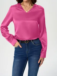 Professional close-up of fuchsia long sleeve satin blouse featuring elegant silky shine