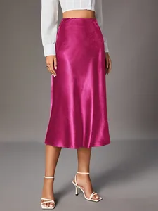Elegant magenta satin midi skirt with glossy silk-like finish for women