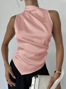Detailed close-up of a pink sleeveless satin blouse with an elegant draped neckline design