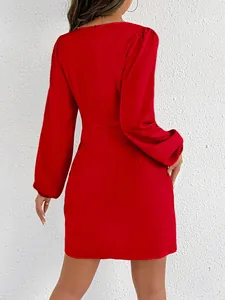 Detailed back view of a vibrant red satin mini dress featuring elegant balloon sleeves