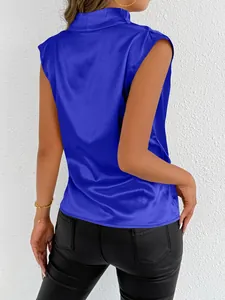 Close-up detail of the back of a royal blue satin sleeveless mock neck shirt for women