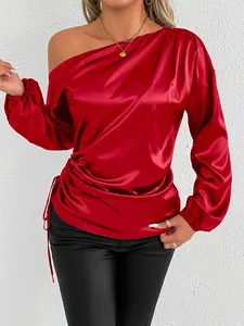 Elegant red satin off-the-shoulder blouse with long sleeves and drawstring detail
