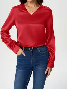 Elegant red satin long-sleeved blouse featuring a classic V-neck and luxurious silky texture