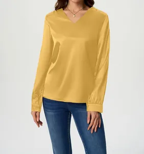 Front view of elegant mustard yellow long sleeve satin blouse with V-neckline