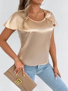 Elegant champagne satin short sleeve top featuring luxurious silk-like fabric texture