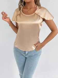 Elegant champagne gold satin short-sleeve top showing smooth silk-like texture