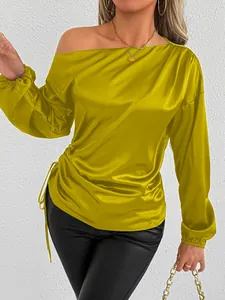 Detailed look at elegant olive green satin shirt with asymmetric neck and side drawstring
